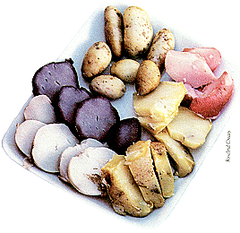 PLATE OF SLICED POTATOES - MANY DIFFERENT COLORS OF FLESH